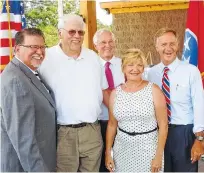  ?? STAFF PHOTO BY TIM OMARZU ?? Dunlap parachute-maker Precision Aerodynami­cs was praised Friday at a ceremony in Harris Park by elected officials for its commitment to create 100 new jobs and spend $1.58 million to move into the shuttered Tecumseh small engine plant. From left,...