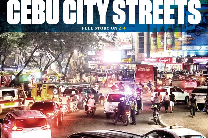  ?? SUNSTAR FOTO / ALEX BADAYOS ?? DO YOUR PART. Motorists and public utility vehicles jostle for their place on the busy Fuente Osmeña rotunda in Cebu City. Around 40,000 vehicles, or double the usual number of vehicles, were on the road in Cebu City on Friday amid the Christmas rush. Traffic officials remind motorists to follow traffic rules in order to avoid accidents and further traffic, as road congestion is still expected to worsen as Christmas and New Year’s Day approach.