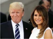  ?? ASSOCIATED PRESS FILE PHOTO ?? President Donald Trump and first lady Melania Trump arrive at a concert on the first day of the G-20 summit in Hamburg, northern Germany, last month. The White House announced Trump and the first lady decided not to participat­e in events honoring...