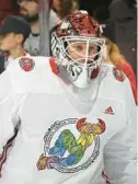  ?? BRUCE BENNETT/GETTY ?? Devils’ Vitek Vanecek skates in warm-ups wearing the Pride Night jersey prior to the game against the Bruins on Dec. 28 at the Prudential Center in Newark, New Jersey.