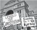  ?? DEBORAH CANNON/AMERICAN-STATESMAN ?? Protesters rally outside the Texas Capitol before the state’s Electoral College votes were to be cast in 2016.