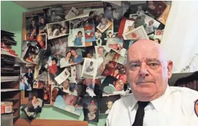  ?? ASSOCIATED PRESS ?? Tim Jaccard sits in front of snapshots of some of the children who were safely relinquish­ed under a “Safe Haven” program he started 17 years ago, in Wantagh, N.Y.
