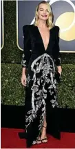  ??  ?? Margot Robbie’s dress is drop dead gorgeous.