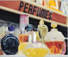  ?? BRENT DAVIS WATERLOO REGION RECORD ?? Perfume bottles are displayed at Fritsch Fragrances, which has been a fixture in downtown Kitchener for nearly 60 years.