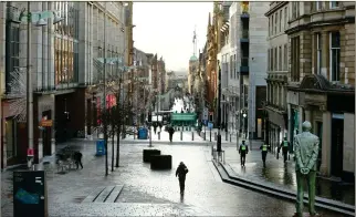  ??  ?? Glasgow’s near-deserted Buchanan Street shows how retailers have been hit by the virus lockdown