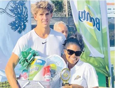  ?? PHOTOS BY LENNOX ALDRED ?? Open champion Blaise Bicknell poses for a photo with Bounty Brand Manager Jodi Hyatt.