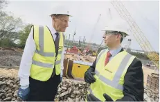  ??  ?? ICE president Sir John Armitt, left, on a recent visit to Sunderland’s New Wear Crossing with Stephen McCaffrey, Project Director FVB.