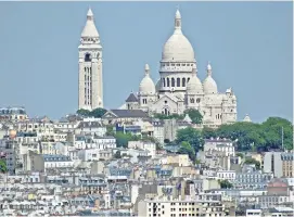  ??  ?? Prayers answered... Sacre-Coeur Basilica in Paris, where cat was found