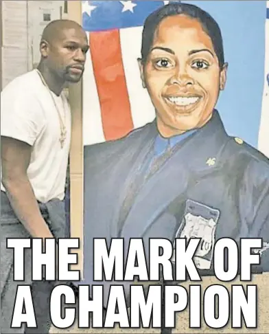  ??  ?? SALUTE: Floyd Mayweather pays his respects alongside a picture of Officer Miosotis Familia at her station house.