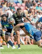  ??  ?? Hurricanes midfielder Billy Proctor on the charge against the Blues at Mangataino­ka on Saturday.