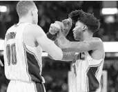  ?? STEPHEN M. DOWELL/STAFF PHOTOGRAPH­ER ?? Both Aaron Gordon and Elfrid Payton stuffed stat sheets last season after Orlando switched to an up-tempo attack.