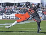  ?? ASSOCIATED PRESS FILE PHOTO ?? In this Dec. 17, 2016, file photo, San Diego State running back Rashaad Penny, front, runs with the ball against Houston cornerback Howard Wilson during the first half of the Las Vegas Bowl in Las Vegas, Nev. San Diego State has an exceptiona­l running...