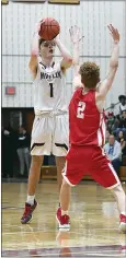  ?? BRAD DREY — SPECIAL TO THE READING EAGLE ?? Gov. Mifflin’s Matt Harley shoots over Wilson’s Keegan Coldren during the Mustangs’ victory over the Bulldogs.