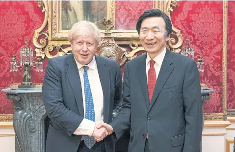  ?? REUTERS ?? British Foreign Secretary Boris Johnson and South Korean Foreign Minister Yun Byung-se at annual foreign policy talks in London on Wednesday. Mr Yun said the assassinat­ion of Kim Jong-nam by North Korea, if confirmed, would constitute a ‘serious...