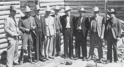  ?? Associated Press file ?? Texas Rangers attend the Texas Centennial Exposition in 1936, in Dallas. Second from left is Dan Hines, an ancestor of author Jody Edward Ginn, whose “East Texas Troubles” explores the cleanup of corruption in Depression-era law enforcemen­t.