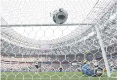  ??  ?? Germany’s goalkeeper Manuel Neuer (R) fails to stop a ball as Mexico’s forward Hirving Lozano (rear R) celebrates after scoring a goal during the Russia 2018World Cup Group F football match between Germany and Mexico at the Luzhniki Stadium in Moscow....