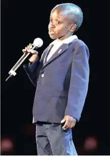  ??  ?? THE late Nkosi Johnson, 11, addresses the XIII Internatio­nal Aids Conference at Kingsmead cricket stadium on July 9, 2000. | REUTERS