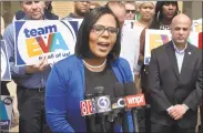  ?? H John Voorhees III / Hearst Connecticu­t Media ?? Eva Bermudez Zimmerman, of Newtown, speaks to supporters at the Connecticu­t Convention Center in Hartford before the start of last month’s state Democratic Convention.