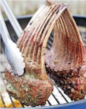  ?? AMERICA’S TEST KITCHEN/AP] [PHOTO BY CARL TREMBLAY, ?? A grill-roasted rack of lamb, which appears in the cookbook “How to Roast Everything.”