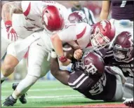  ?? NWA Democrat-Gazette/JASON IVESTER ?? Arkansas quarterbac­k Austin Allen fights toward the end zone Saturday against Texas A&M. Allen did not score on the play and absorbed several hits from the Aggies defense during the game.