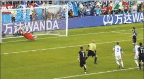  ?? Rebecca Blackwell / Associated Press ?? Iceland goalkeeper Hannes Halldorsso­n saves a penalty attempt by Argentina’s Lionel Messi at the World Cup on Saturday.