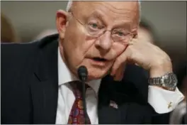  ?? AP PHOTO/EVAN VUCCI ?? Then-Director of National Intelligen­ce James Clapper testifies on Capitol Hill in Washington on Jan. 5 before the Senate Armed Services Committee hearing: “Foreign Cyber Threats to the United States.”