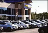  ?? Arnold Gold / Hearst Connecticu­t Media file photo ?? CarMax on Frontage Road in East Haven. Connecticu­t Attorney General William Tong announced Friday that the state would receive more than $20,000 as a part of a $1 million multistate settlement with used-car retailer CarMax over its disclosure of safety recalls.