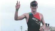  ??  ?? TOO STRONG: Keegan Cooke crosses the line at the Nelson Mandela Bay Triathlon in Summerstra­nd on Saturday