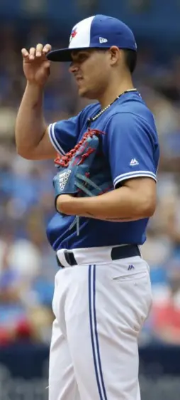  ?? RICHARD LAUTENS/TORONTO STAR ?? Up 5-3 in the ninth, Roberto Osuna uncorked a wild pitch for the first time all season, opening the floodgates for the Angels.