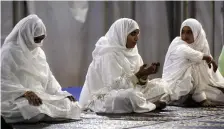  ?? Getty ?? Women in New Delhi prepare to leave for Hajj Iast year