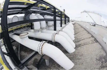  ?? THE CANADIAN PRESS/FILES ?? Petroleum storage facilities in Canada are full to bursting amid a transporta­tion bottleneck, the industry reports.