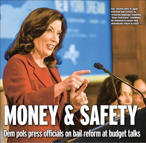  ?? AP ?? Gov. Hochul aims to again overhaul bail system, by stripping language requiring “least restrictiv­e” conditions be imposed to ensure that defendants return to court.