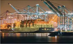  ?? COLEY BROWN/THE NEW YORK TIMES ?? Shipping containers at the port of Los Angeles on Feb. 24. The coronaviru­s pandemic has disrupted internatio­nal trade, driving up the cost of shipping goods and adding a fresh challenge to the global economic recovery.