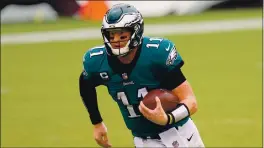  ?? CHRIS SZAGOLA — THE ASSOCIATED PRESS ?? The Eagles’ Carson Wentz plays against the Bengals on Sunday in Philadelph­ia.