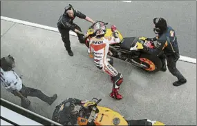  ?? FOTO: SIMONE ROSA ?? Marc Márquez El cambio de moto de Phillip Island’13 en la vuelta equivocada