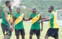  ?? IAN ALLEN/PHOTOGRAPH­ER ?? Jamaica senior men’s football team head coach Theodore ‘Tappa’ Whitmore (right) relays instructio­ns to his players in a Reggae Boyz training session on Friday ahead of their internatio­nal friendly match against hosts Trinidad and Tobago on Thursday.