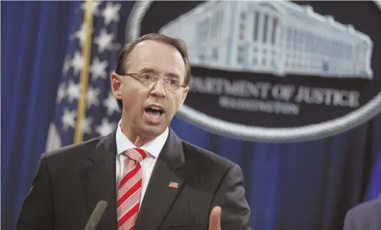  ?? AP PHOTOS ?? BOMBSHELL: Deputy Attorney General Rod Rosenstein, above, speaks during a news conference at the Department of Justice yesterday. The indictment of 12 Russian military officers comes just days before a summit between Vladimir Putin and President Trump, seen below in 2017.