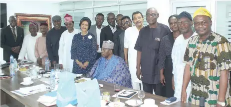  ?? PHOTO: GREGORY ONYEJOSE ?? Members, Editorial Board of Guardian Newspapers, Kunle Sanyaolu ( left); Jacob Akindele; Dr. Luke Onyekakeya­h; Editor- in- Chief, Martins Oloja; Chairman, Prof. Wale Omole; Publisher, Lady Maiden Alex- Ibru; Gen. Chris Ali ( seated); Matthew Ozah; Dr. Wole Oyebade; Dr. Femi Adekoya; Sonnie Ekwowusi; Dr. Alex Thomopoulo­s; Prof. Ndubisi Nwokoma; Eki Durojaiye; Francis Onaiyekan and Prof. Jide Jimoh at the 73rd Birthday of the Publisher, Lady Maiden Alex- Ibru, at Rutam House, Lagos… yesterday.