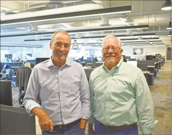  ?? Alexander Soule / Hearst Connecticu­t Media ?? Remedy Partners founder Steve Wiggins, left, alongside CEO Chris Garcia at the health insurance company’s headquarte­rs in Norwalk.