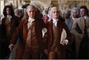  ?? COURTESY OF APPLE TV+ ?? Michael Douglas, left, as Benjamin Franklin, and Noah Jupe, as his grandson, Temple, appear in a scene from “Franklin.”