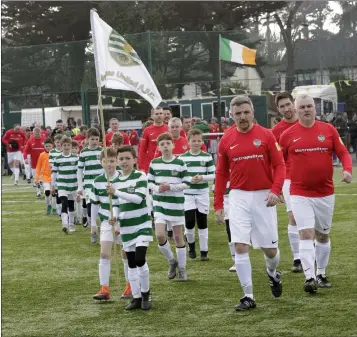  ??  ?? Eoin Lynch leads out the Carling team at Woodlands last Saturday. Photos: Barbara Flynn