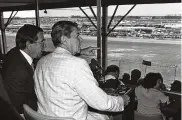  ?? IRA SCHWARZ / AP ?? President Ronald Reagan sits with William France Jr., president of NASCAR and part owner of the Daytona Speedway, at the Firecracke­r 400 in 1984.