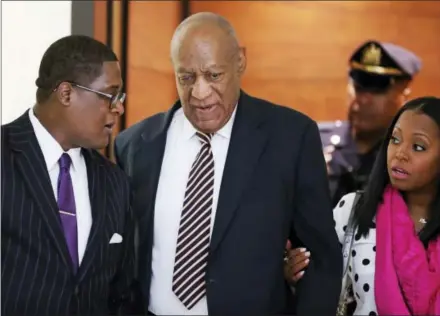  ?? THE ASSOCIATED PRESS ?? Bill Cosby arrives for his sexual assault trial with Keshia Knight Pulliam, right, at the Montgomery County Courthouse in Norristown on Monday.