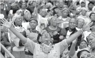  ?? AP Photo/Themba Hadebe ?? ■ Mourners attend a memorial service for anti-apartheid activist Winnie Madikizela-Mandela on Wednesday in Soweto, South Africa. The death of Madikizela-Mandela, often called the “Mother of the Nation,” has triggered widespread soul-searching over the...