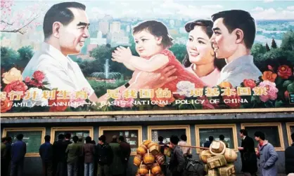  ?? Photograph: Peter Charleswor­th/LightRocke­t via Getty Images ?? A 1985 billboard on China’s one-child policy.