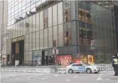  ?? — Reuters file photo ?? A New York City Police car is parked outside the security perimeter for the Trump Tower in New York City on November 10, 2016.