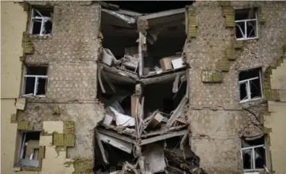  ?? Ap ?? Gesloopte appartemen­tsgebouwen in Bachmoet. De vernieling­en doen denken aan het gehavende Charkov.