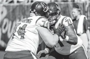  ?? Brett Coomer / Staff photograph­er ?? Tytus Howard, right, was moved from right tackle to left guard in an attempt to improve the run game. So far, the switch hasn’t worked as the run game averages 3.3 yards per carry, the second worst in the NFL.