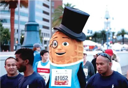  ?? AP FILES ?? Mr. Peanut prepares for his first marathon run at the San Francisco Marathon in 2012.