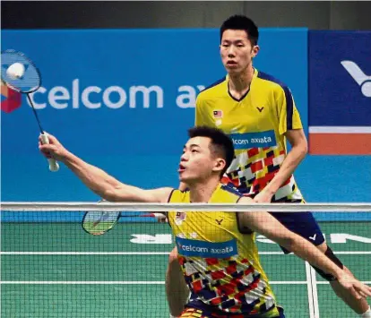  ??  ?? Back to winning ways: Malaysia’s Goh V Shem (back) andTan Wee Kiong won the men’s doubles title at the Thailand Masters to end a two-year drought yesterday.